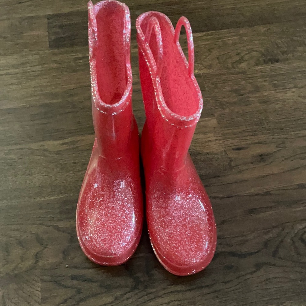 Girls glittery rain boots. Boots never been worn.